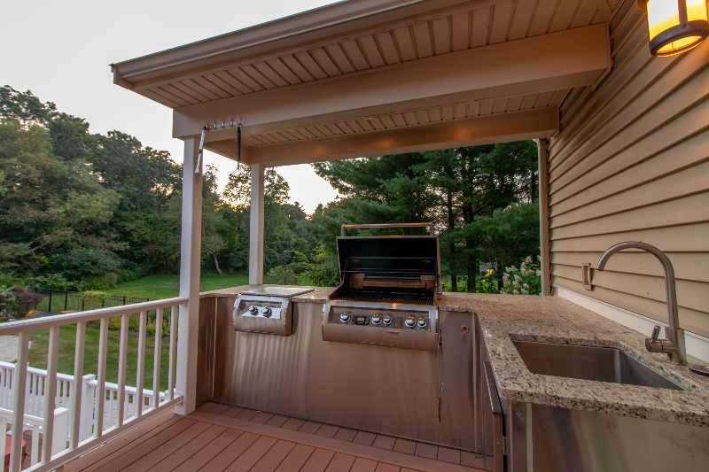 Beautiful outdoor deck with a state of the art integrated deck kitchen
