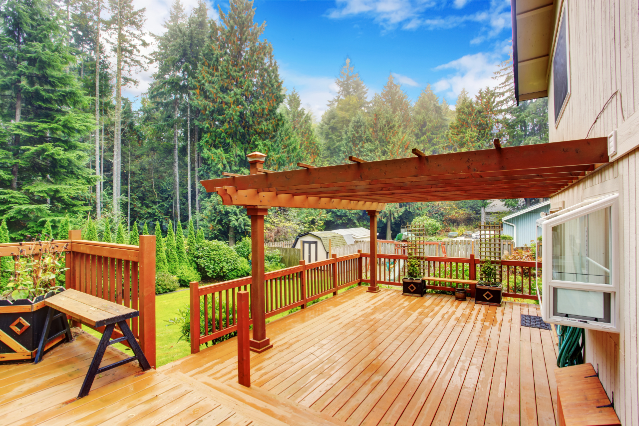 beautiful deck in the springtime with a new pergola