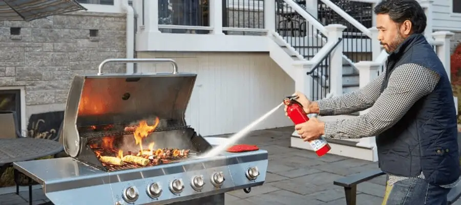 Father grilling on a nice deck