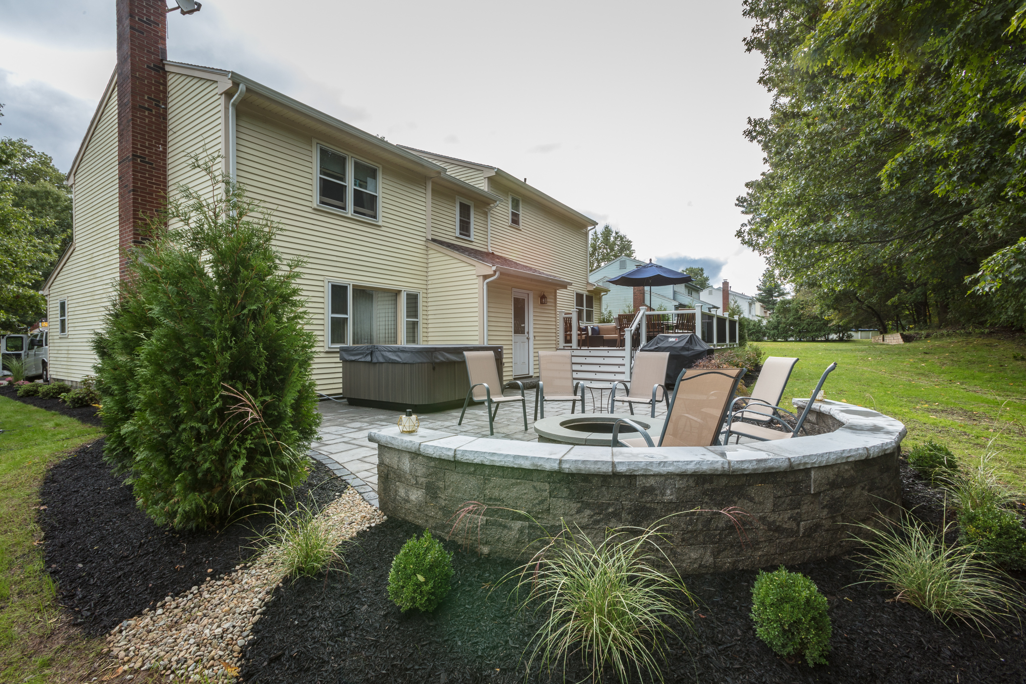 Elegant firepit patio, built by Regan Total Construction