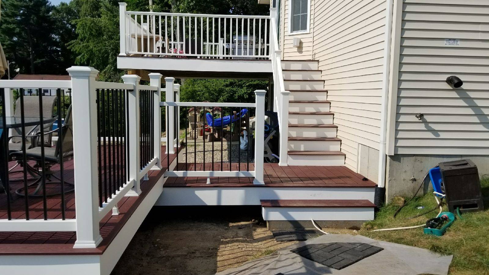 Multi level composite deck, designed and built by Regan Total Construction