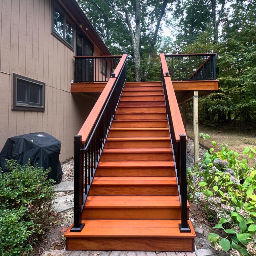Garapa hardwood deck with black aluminum railings in Bloomfield, CT